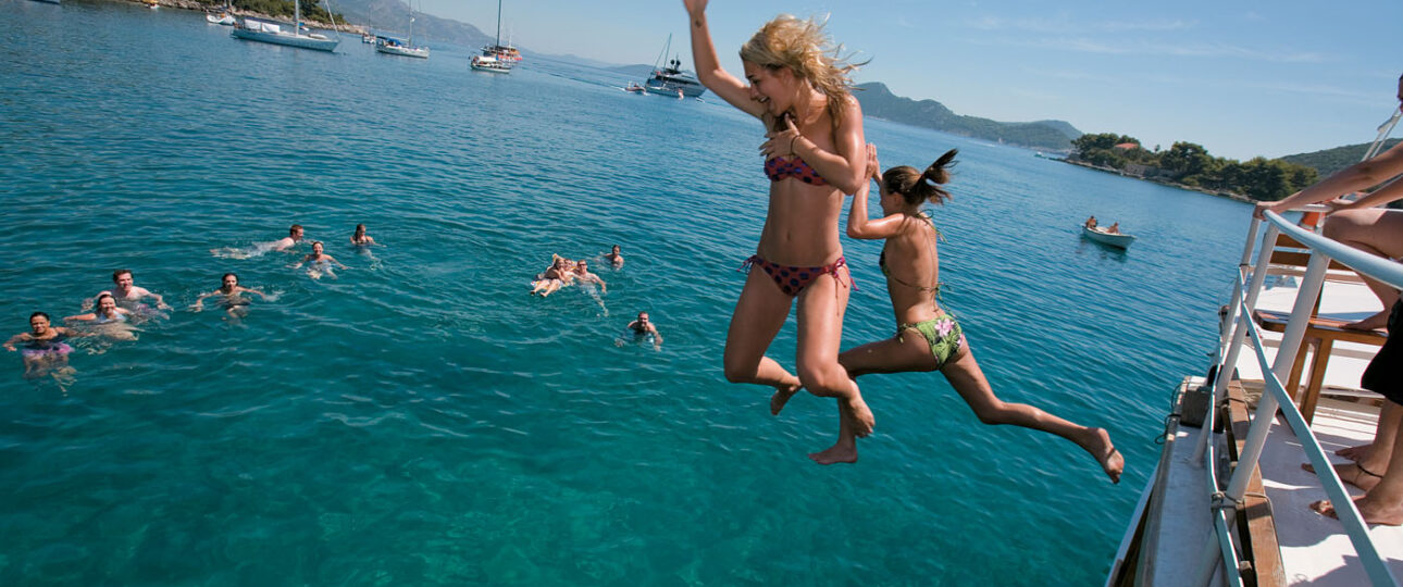 Sailing girls jumping